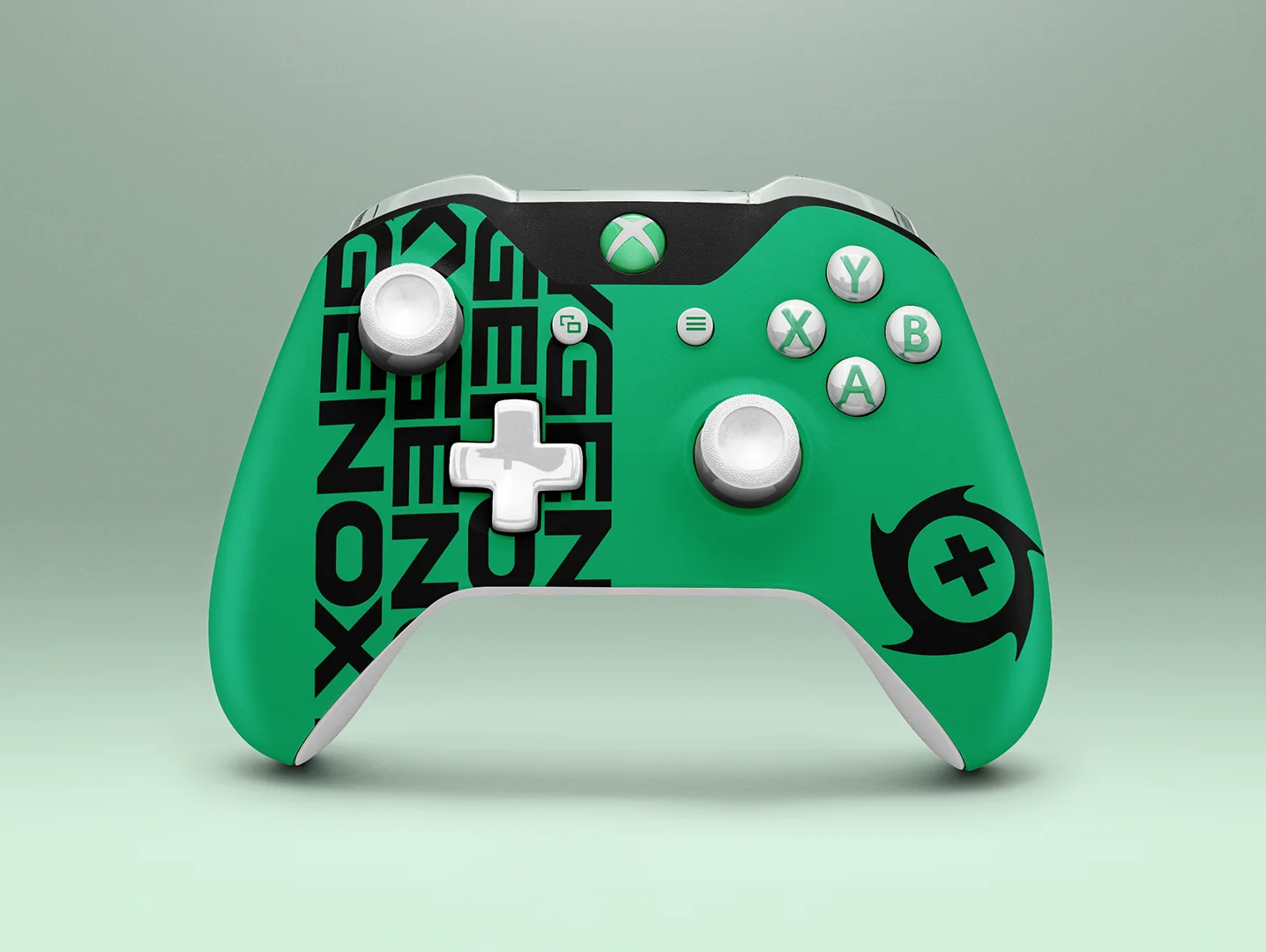 A green game controller printed with Oxygen Esports’ lettering stacked down its left grip and the swirl mark with a cross on its right, on a pale green ground